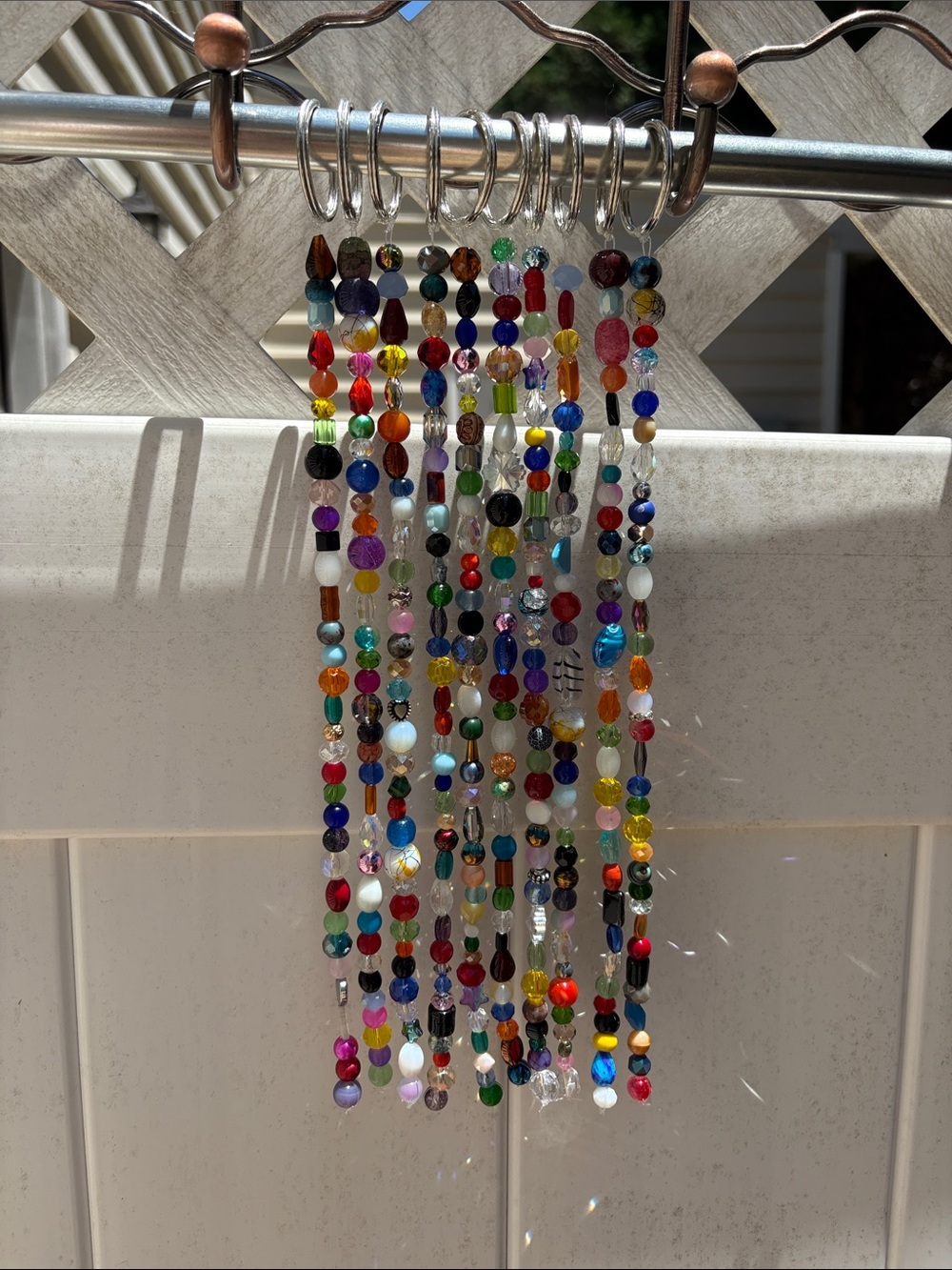 Ten Glass bead strands 12 inches long. All glass and crystal beads.
